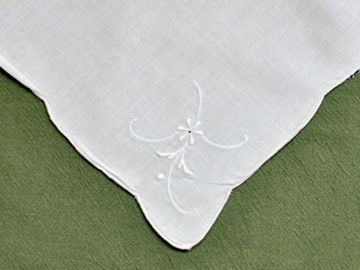 1 Dozen White Dinner Napkins with a Simple Flower Design