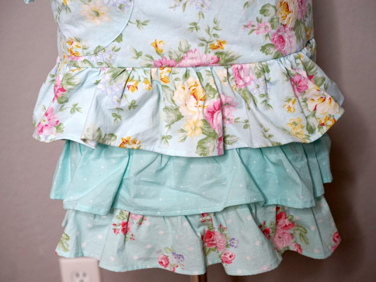 Pastel Blue Floral Apron with Double Ruffle Skirt & Bow Accent