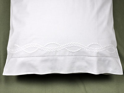 Pair of White Pillowcases with an Infinity Design
